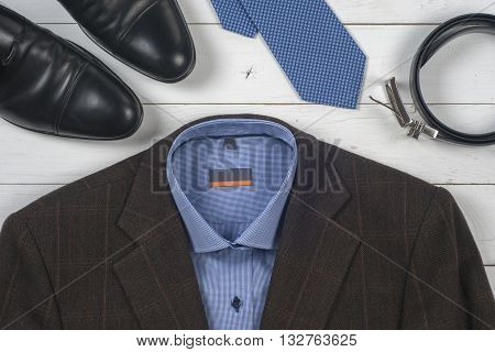 Set Of Men's Clothing And Shoes On Wooden Background. Men Accessories. Black Elegant Accessories
