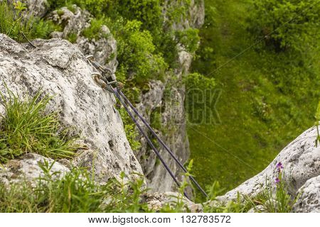 Dynamic rope suspended by the screw carabiners climbing the so-called toproping.