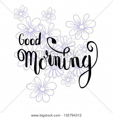 Hand lettering Good Morning with pale violet flowers on the background.
