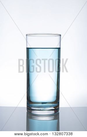 Concept of drinking. glass of fresh water.