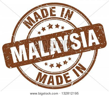 made in Malaysia brown round vintage stamp.Malaysia stamp.Malaysia seal.Malaysia tag.Malaysia.Malaysia sign.Malaysia.Malaysia label.stamp.made.in.made in.