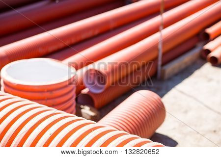 Red background. A large amount of red tubes, picture may be used as a background