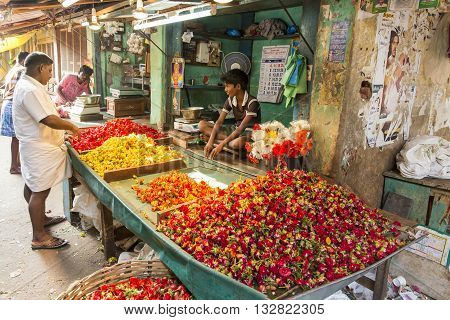 Pondicherry, India, February 21, 2014. Sales of fruits vegetables and flowers in the main market, daily market.