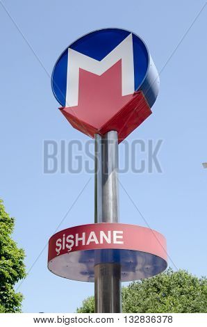 ISTANBUL TURKEY - JUNE 2 2016: sign for the Metro station in the fashionable Şişhane district of Istanbul on a sunny evening in June.