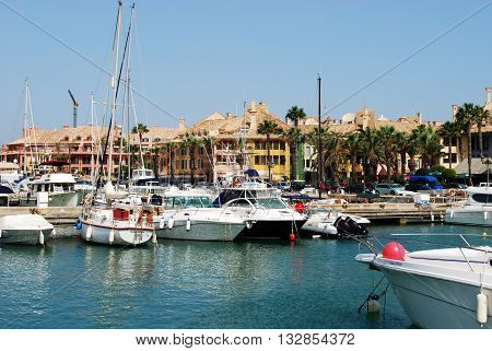 PUERTO SOTOGRANDE, SPAIN - JULY 18, 2008 - Yachts and boats in the marina with buildings to the rear Puerto Sotogrande Cadiz Province Andalucia Spain Western Europe, July 18, 2008.