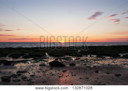 Sunset on Hunstanton Beach in Norfolk, UK.