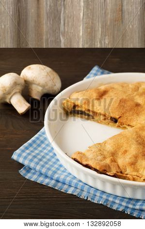 pie with meat and mushrooms. Рomemade baking.