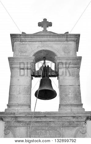 Bell tower of old churche in Piskopiano Crete Greece. Black and white.