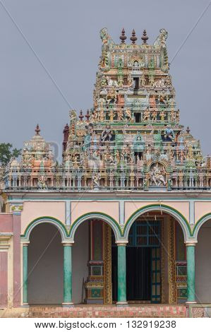 Chettinad India - October 17 2013: Highly decorated Vimanam towers over entrance to the Kothamangalam Shiva Temple.