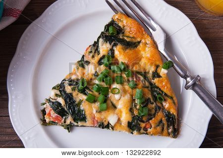 Frittata With Spinach, Tomatoes And Cheese