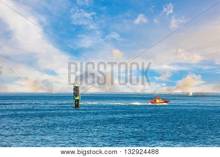 A high speed pilot boat on sea.