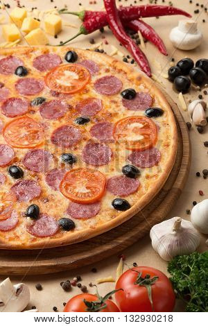 Delicious pizza served on table with vegetable
