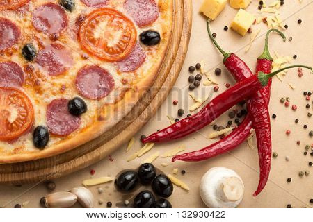 Delicious pizza served on table with vegetable