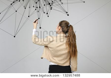 Worldwide network or wireless internet connection futuristic concept. Woman working with linked dots.