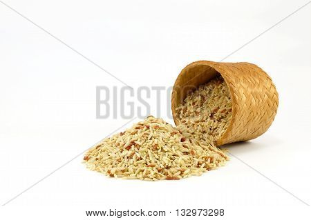 Raw Brown rice in bamboo box (Kratip) on white background