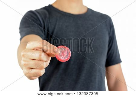 Young man giving condom - sexually transmitted disease control & contraception concepts