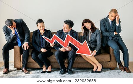 Business people sitting together with statistics icon