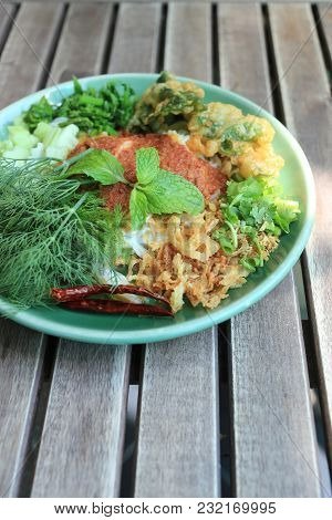 Thai Noodles (kanom Jeen) In A Green Dish On A Food Table.