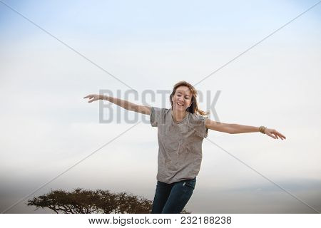 Girl Have Fun In Desert In A Summer Day