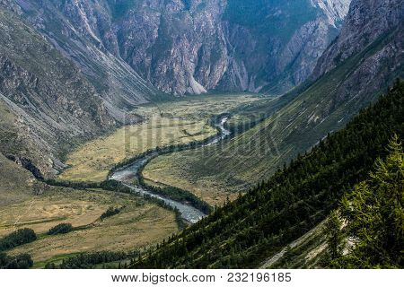 Photo Made In The Altai, Can Be Seen The River Of The Mountain And Forest