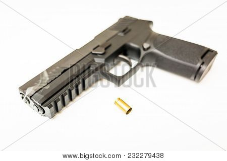 Handgun With Ammo Rounds And Smoke