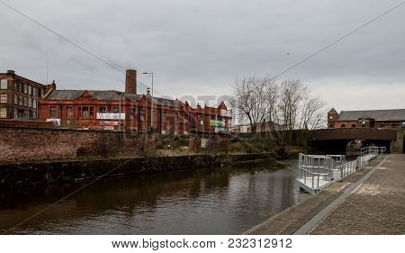 The Cobble Towpath Alongside The Canal And The Metal Landing Pontoon