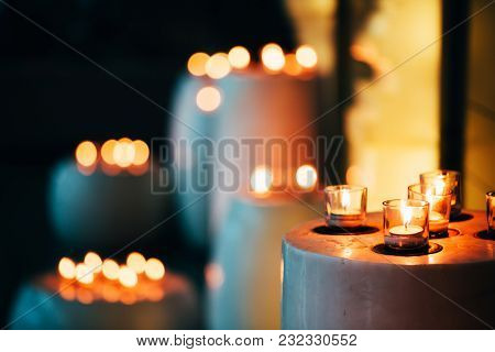Candles In Spa Zone With Beautiful Relaxing Liight And Dlurry Colorful Backdrop.