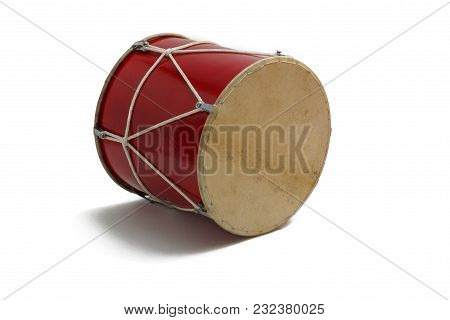 Georgian Traditional Musical Instrument, Drum Red Colored Named Doli Lying On Its Side Close-up Isol