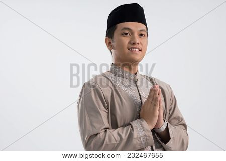 Another Angle Of Religious Man Standing And Greeting