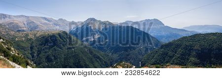 Panoramic View Of Mountain In National Park Of Tzoumerka, Greece Epirus Region. Mountain In The Clou