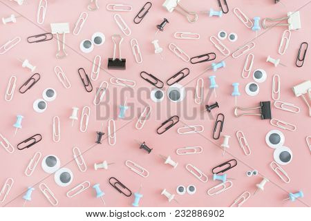 Photos With Scattered Stationery. Funny Faces With Puppet Eyes And Black Eyebrows Made Of Paper Clip