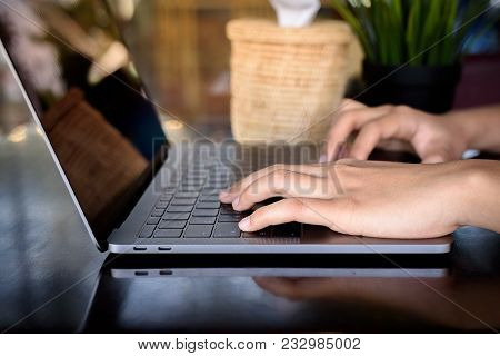 Typing Keyborad Of Laptop On The Table