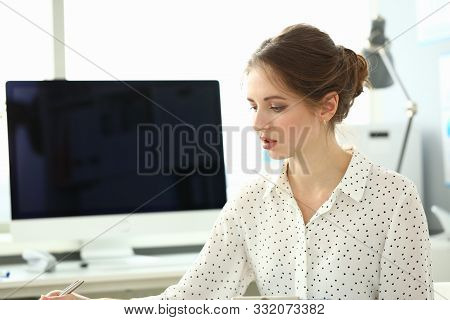 Portrait Of Smart Lady Sitting In Big Modern Office In Trendy White Bluse And Talking With Friendly 