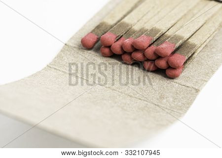 A Macro Shot Of An Open And Partially Used Matchbook.