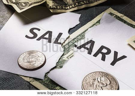 The Inscription Salary Is Torn In Half. Concept On The Financial Crisis. There Will Be No Salary