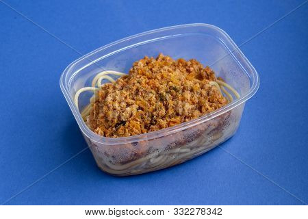 Pasta With Minced Meat And Onion In Navy-style On A Blue Background.