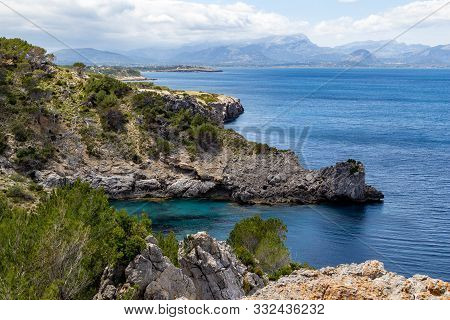 Bay Ses Caletes On The Peninsula La Victoria, Mallorca With Rocky Coastline And Turquoise Clear Wate