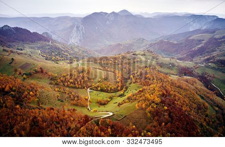 aerial view of Carpathian mountains countryside in autumn morning, Romania