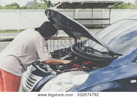 Woman Unhappy And Dismal From Car Engine Problem