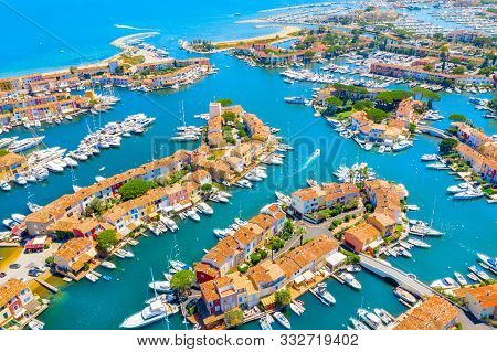 View Of Colorful Houses And Boats In Port Grimaud During Summer Day-port Grimaud