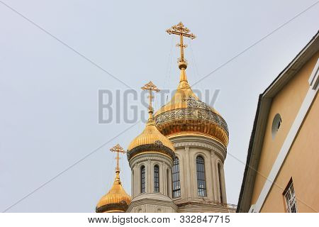 Church Golden Domes Street View. Old Cathedral With Onion Cupola With Cross