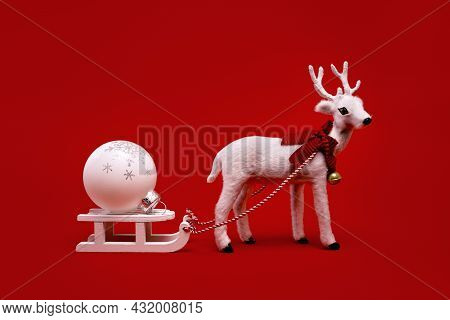 White Toy Reindeer On Christmas Red Background