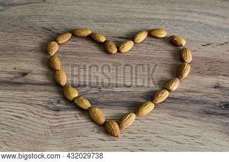 Almonds Lying On The Table In The Form Of A Heart.