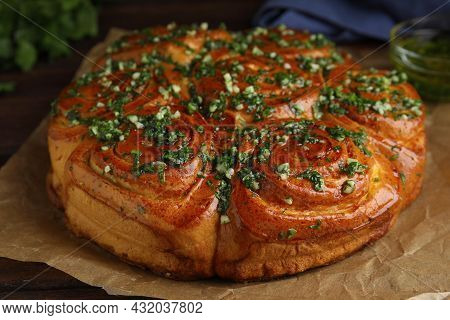 Traditional Ukrainian Garlic Bread With Herbs (pampushky) On Wooden Table, Closeup