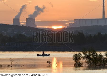 Sunrise Over The Ob Rive. Pink Morning Over The Siberian River, Trees In The Water, The Reflection O