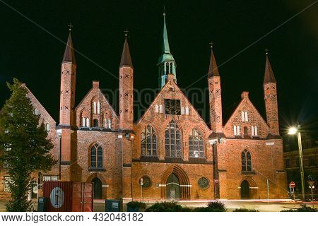 Heiligen Geist Hospital (holy Spirit Hospital) In Lubeck At Night, One Of The Oldest Existing Social