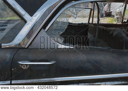 Close Up Of A Door Buckle Of An Old Rusty Car With Broken Window