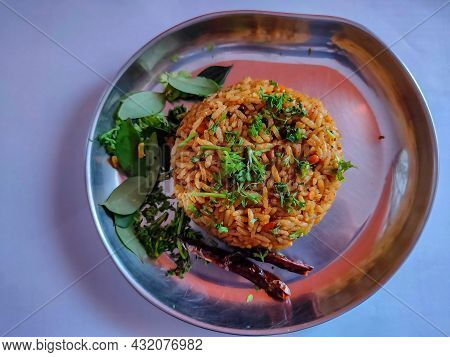 Stock Photo Of Delicious Popular South Indian Rice Dish Puliyogare, Its Also Called Pulihora Or Puli