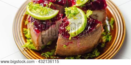 Seasoned British Pork, Wrapped In Crisp, Flavoursome Pastry Served With  Beetroot And Orange Chutney