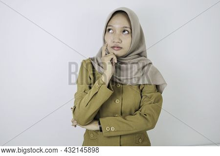 Confused Government Worker Women Have Thinking Gesture. Pns Wearing Khaki Uniform.